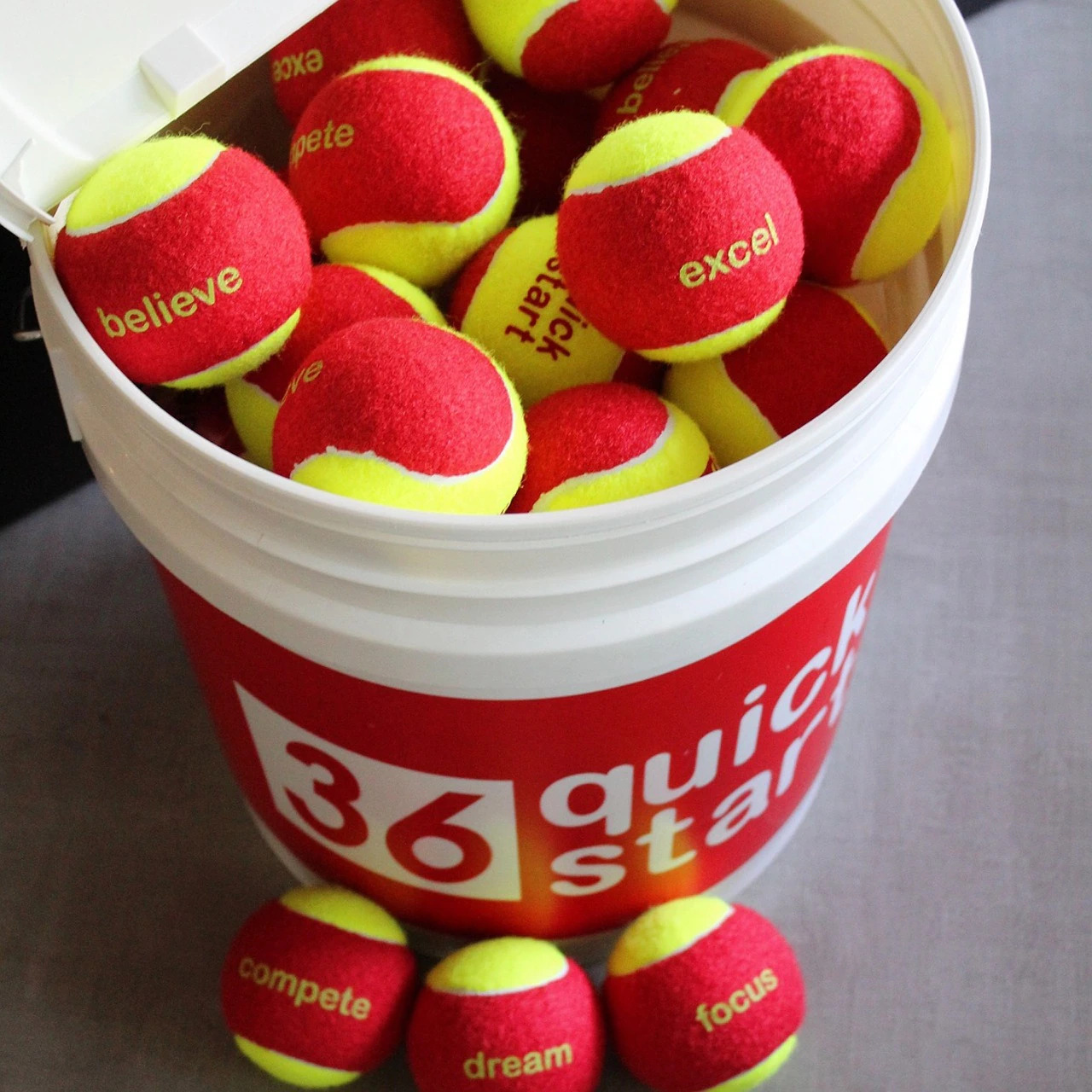 BQ3648 "Quick Start 36" Red Felt Tennis Balls w/ Slogans - 48 Ball Bucket